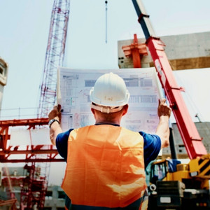 Site engineer checking data on a construction site